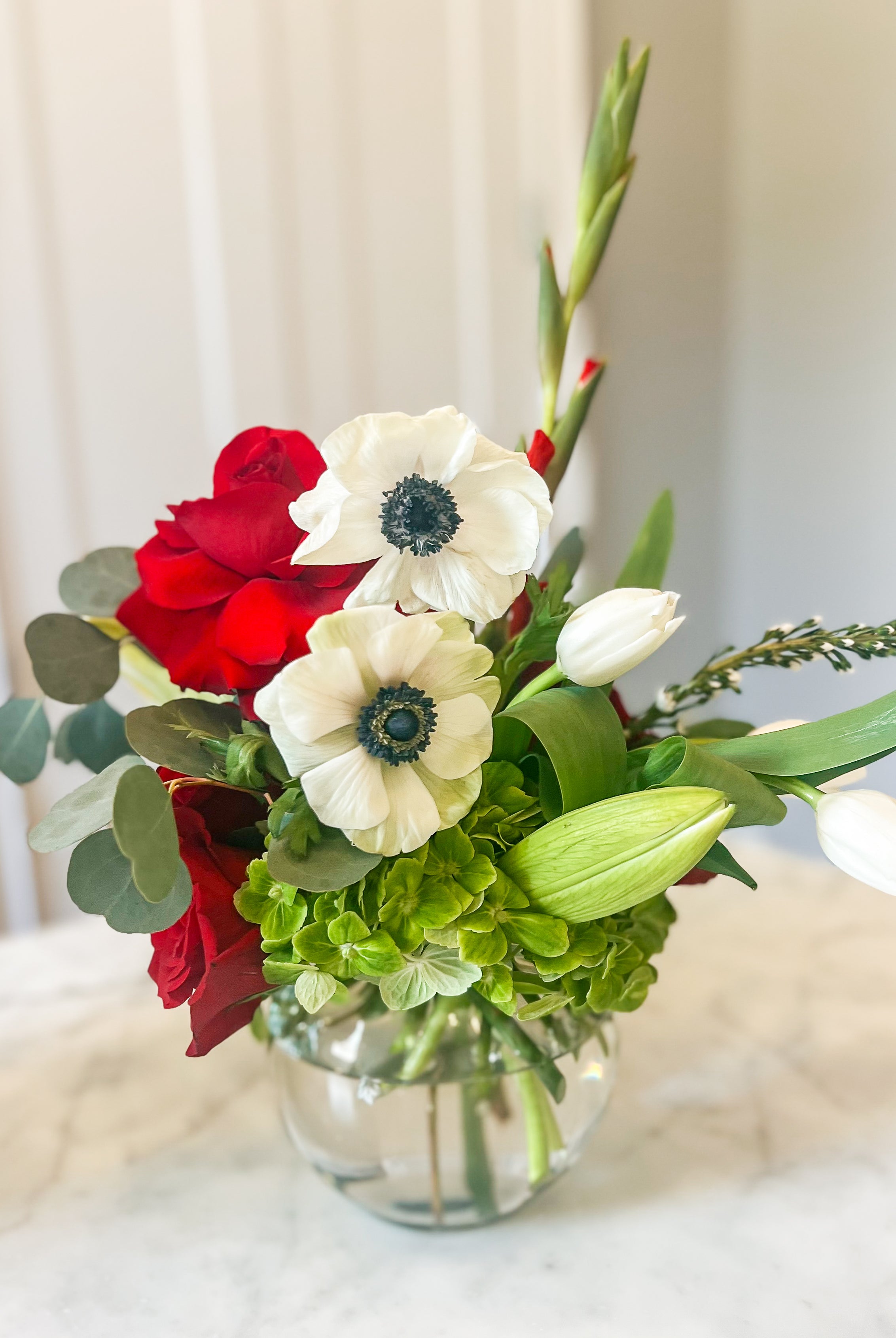 Red and white Alabama themed flower arrangement